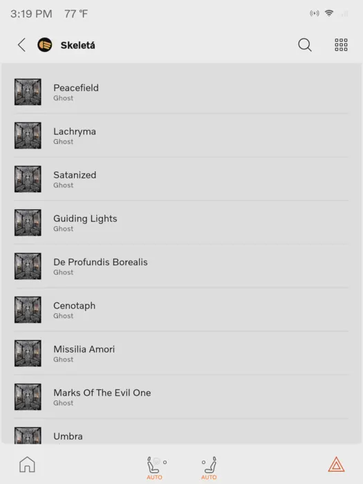 The EX30 media screen showing the track list of Skeleta by Ghost in a light theme, each row with cover art, title and artist.